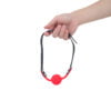 Banoch   Ballgag siliconen met verstelbare band   Rood   Bal ∅ 4 cm hangend in hand
