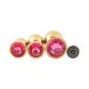 Banoch 3 maten gouden metalen Buttpluggen met donker roze Diamant maat smallmedium large. Aurora scaled scaled